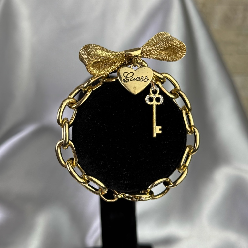 Guess Bow Bracelet with Heart and Key Charm | Adjustable | Gold
